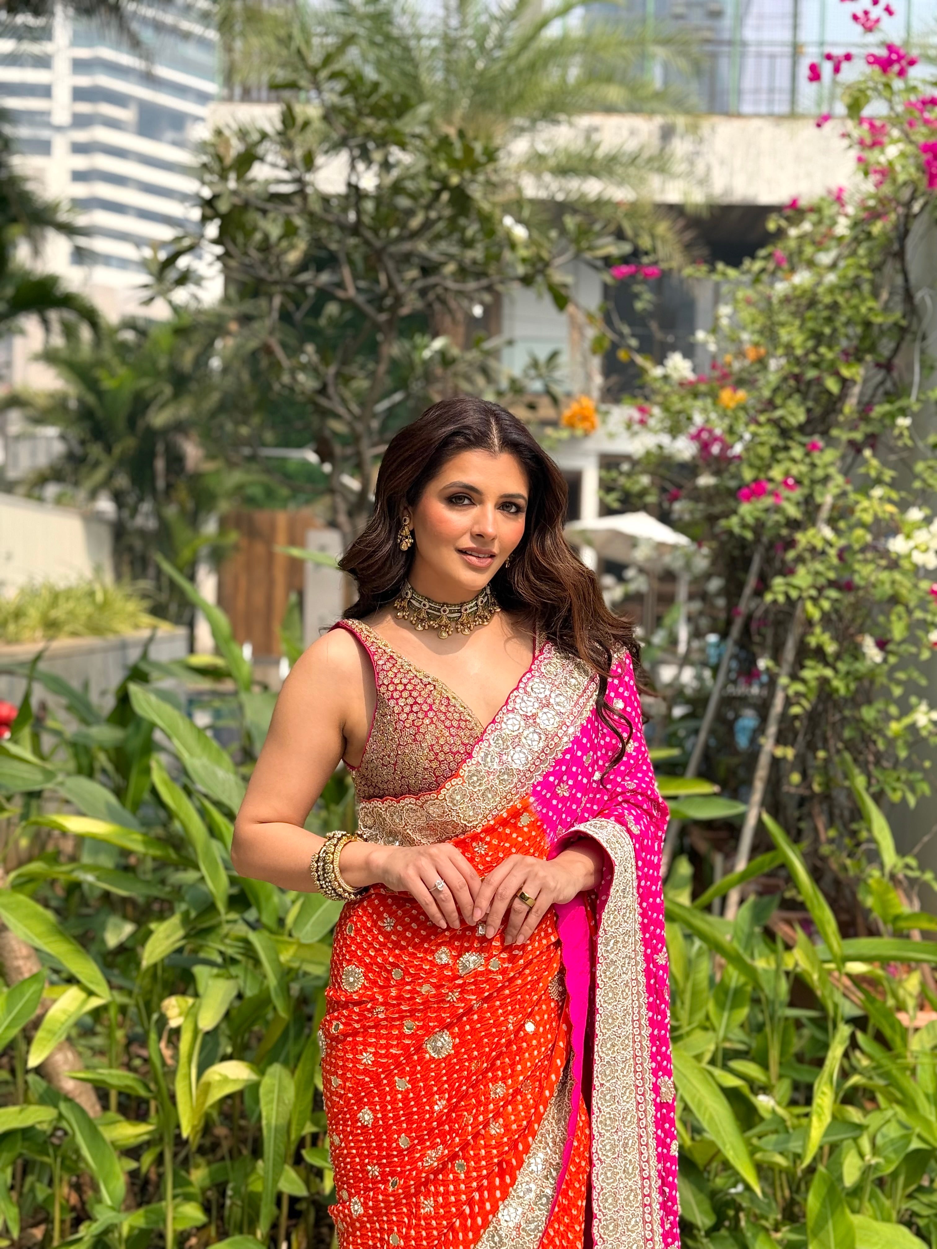 NATASHA LUTHRA In Orange pink bandhani saree