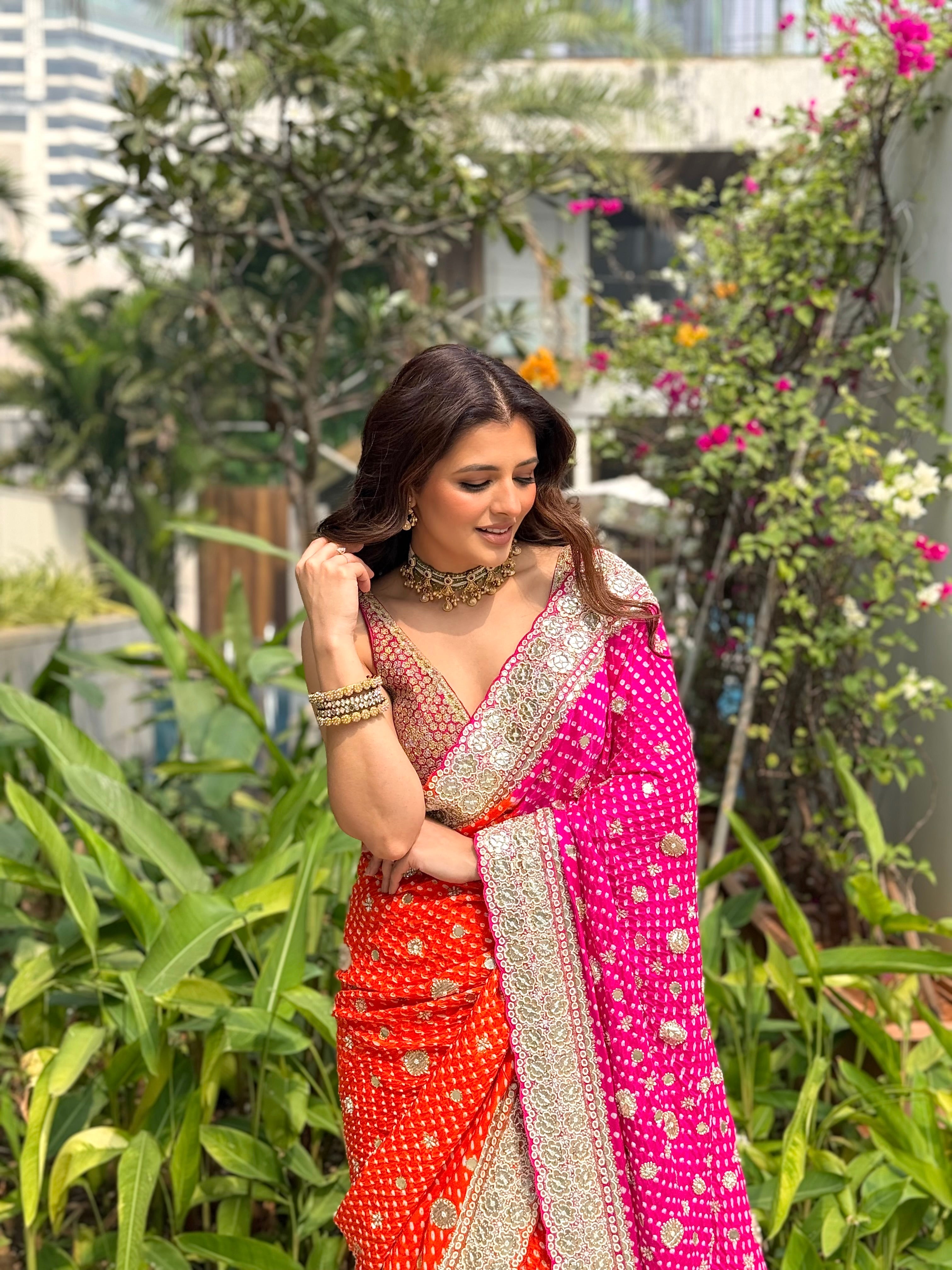 NATASHA LUTHRA In Orange pink bandhani saree