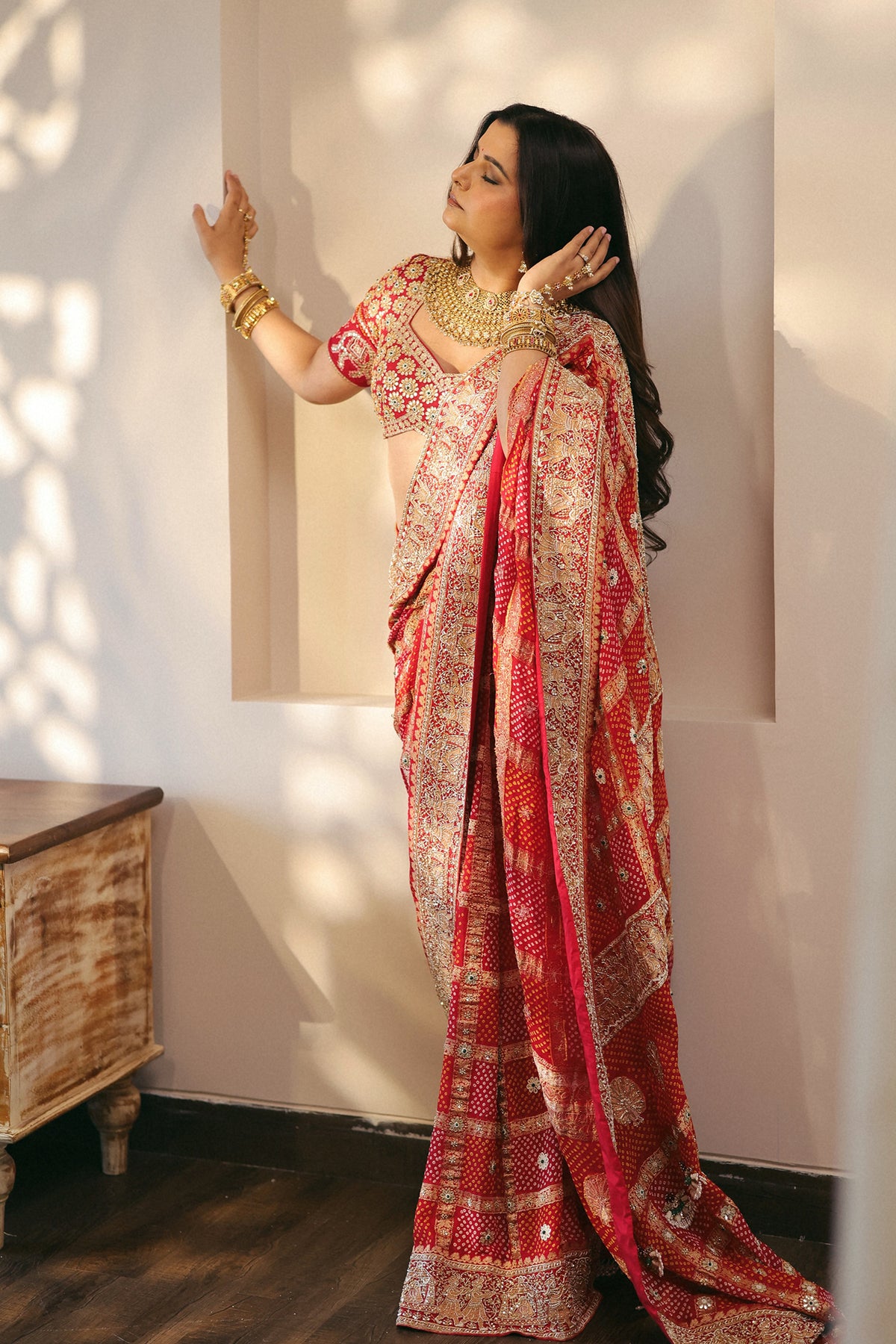 Radhika Bhardwaj In Royal Red Ghatchola Bandhani Saree Set