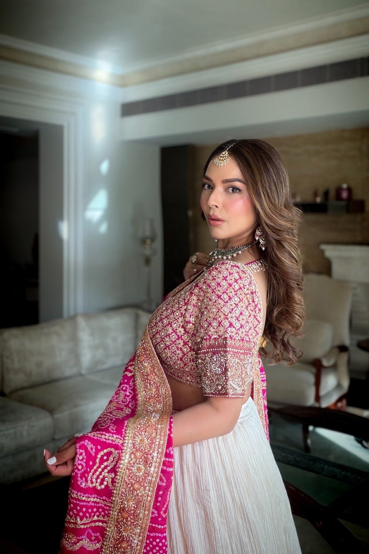 Chandni Girdhar In Ivory Crush Lappa Lehenga with Pink Bandhani Dupatta
