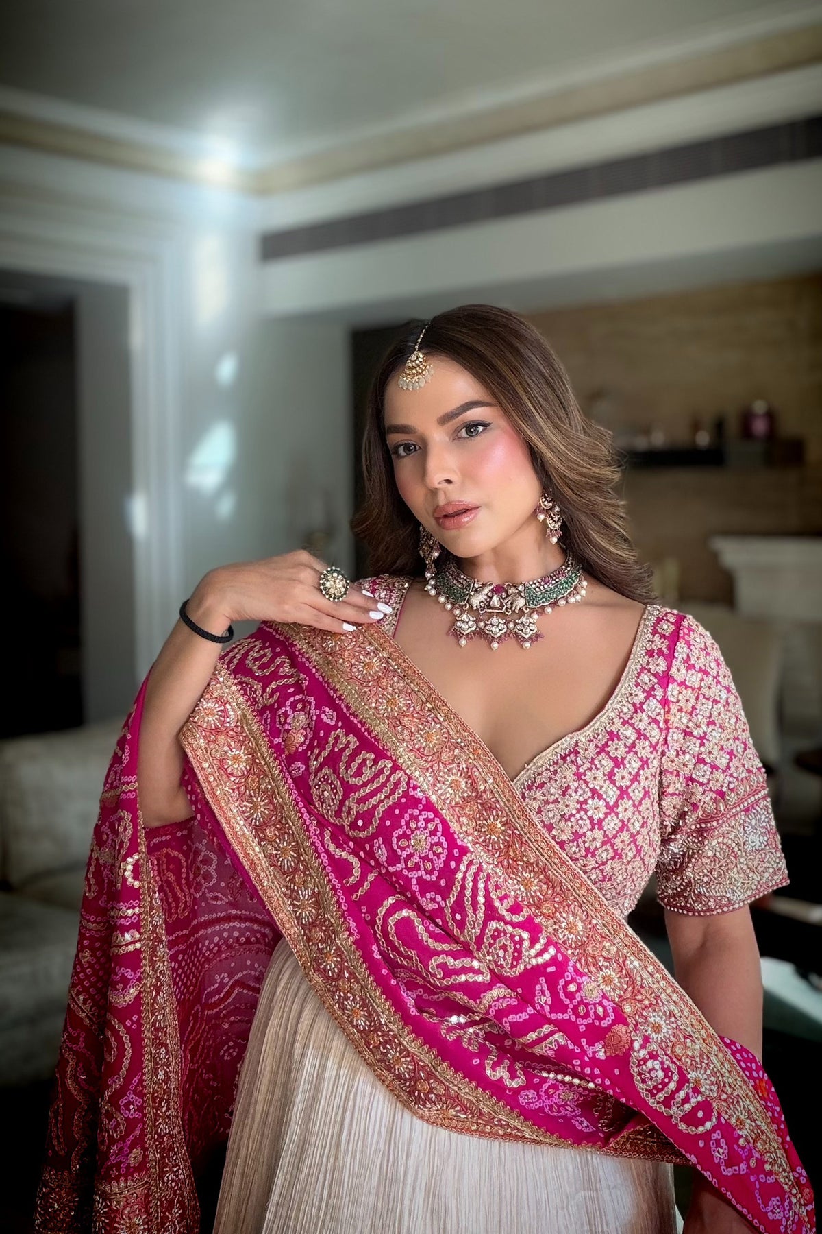 Chandni Girdhar In Ivory Crush Lappa Lehenga with Pink Bandhani Dupatta