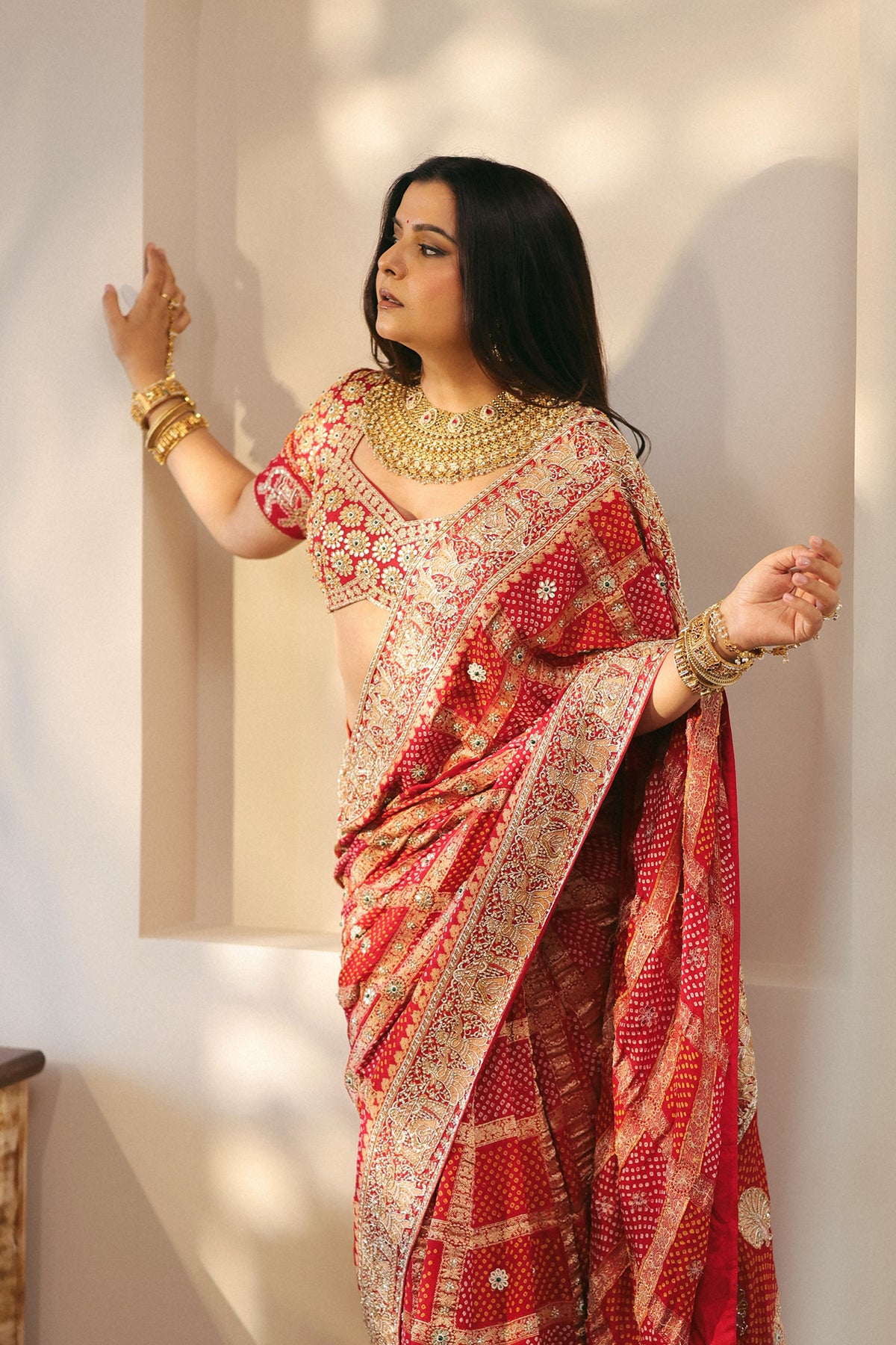 Radhika Bhardwaj In Royal Red Ghatchola Bandhani Saree Set