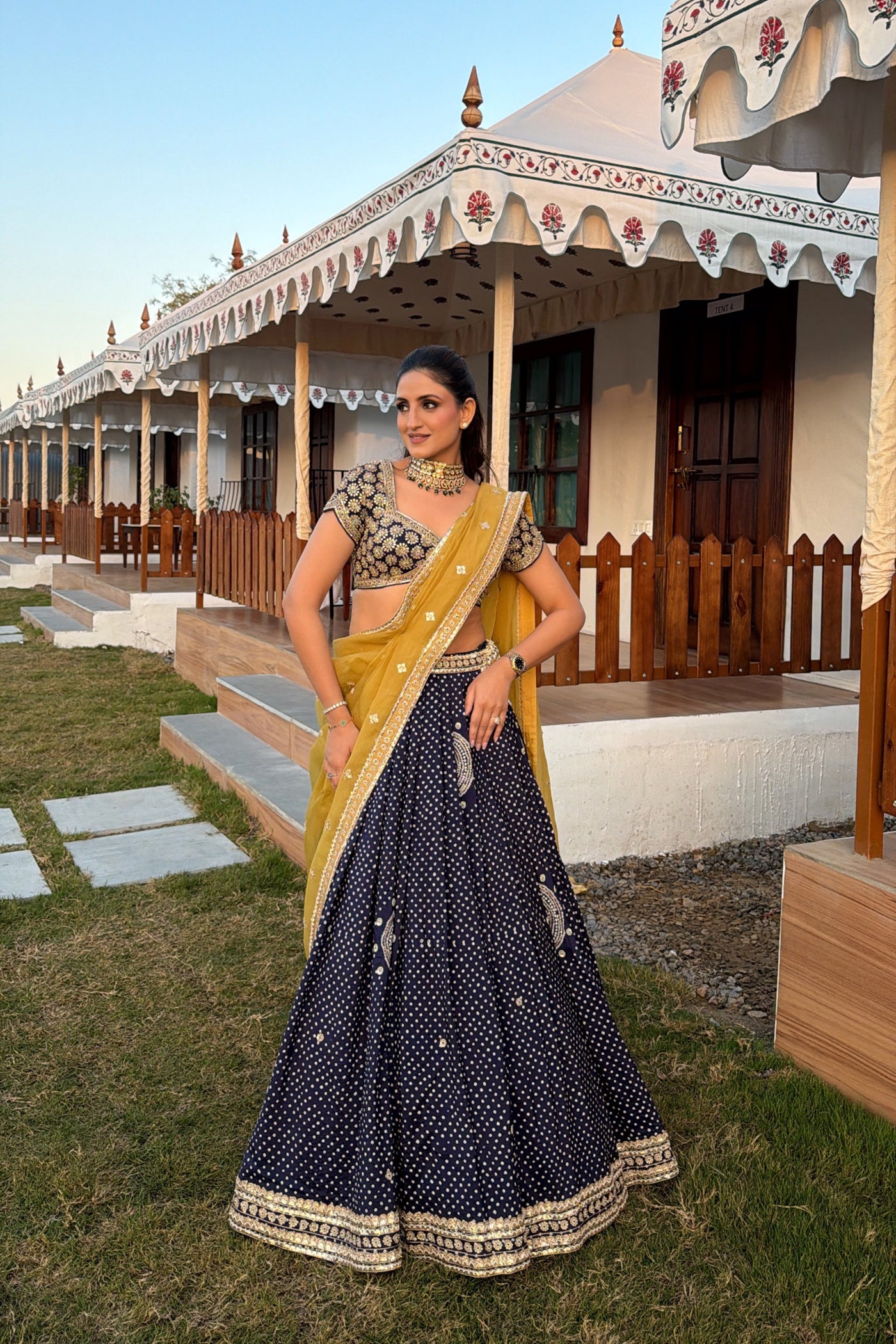 KAARISHMA YADAV BHALLA In Blue bandhani lehenga with lime green organza dupatta