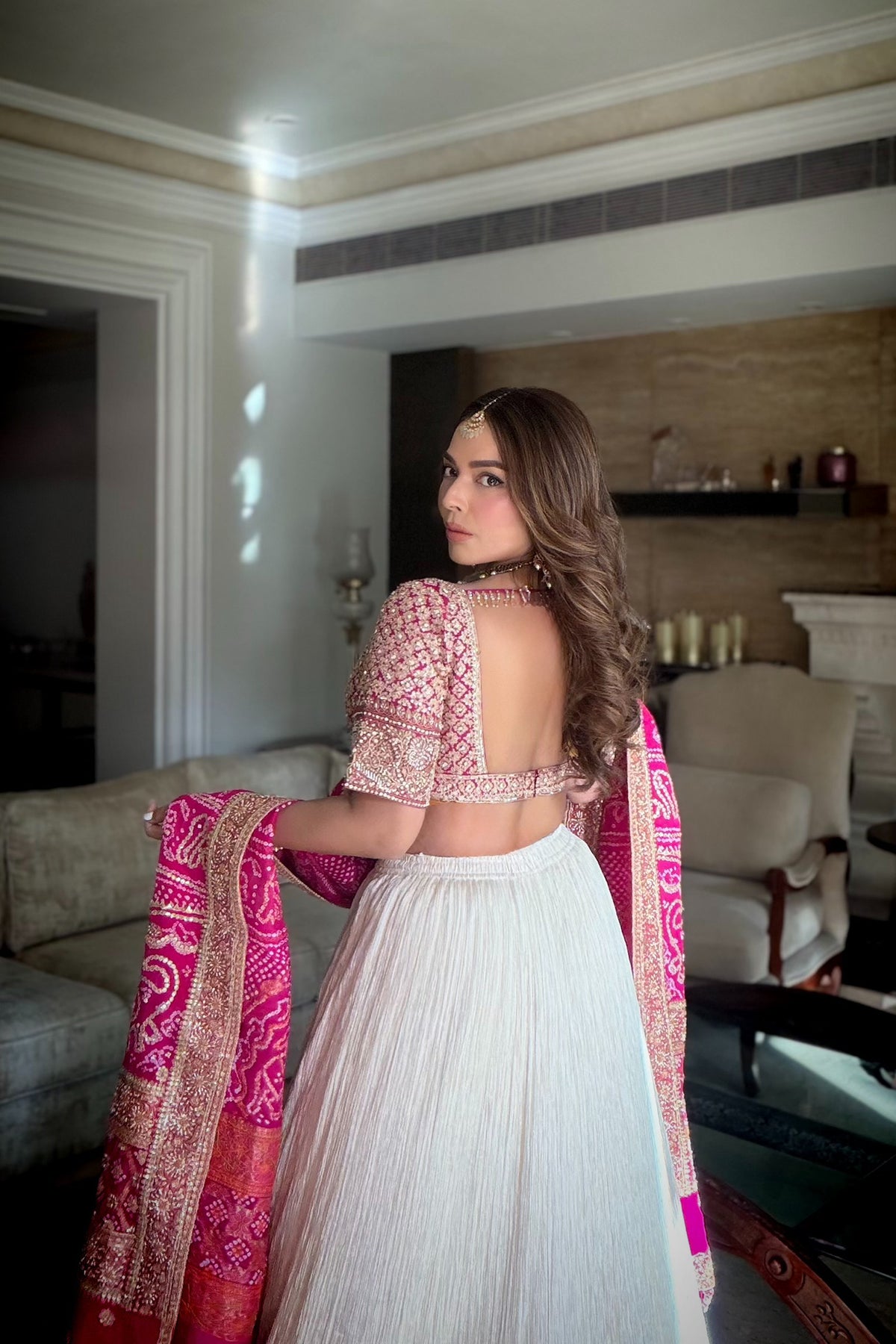 Chandni Girdhar In Ivory Crush Lappa Lehenga with Pink Bandhani Dupatta